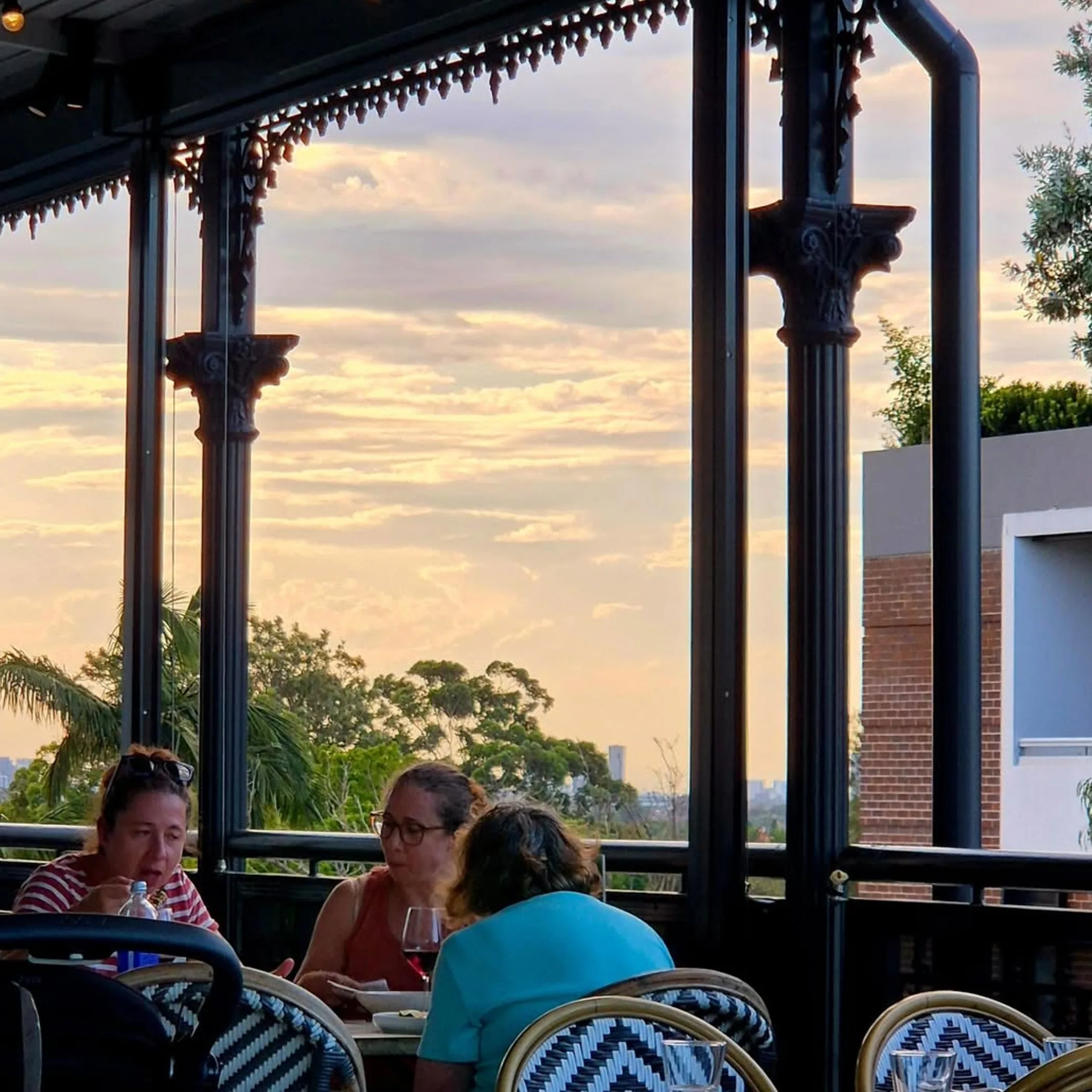 well-lit verandah with outdoor dining